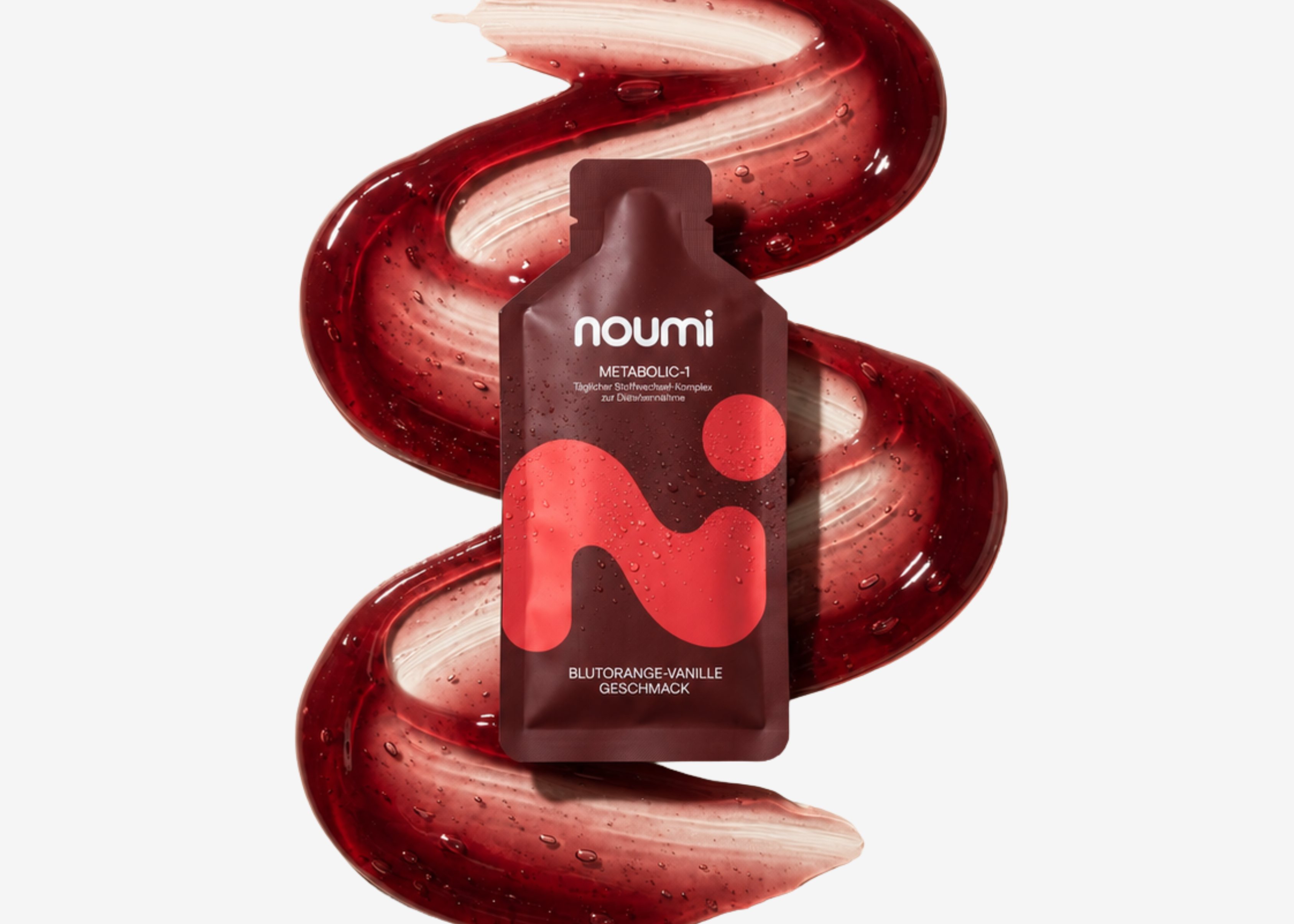 noumi Metabolic-1 Sachet vor geschwungenem rotem Gel-Swirl auf weißem Hintergrund